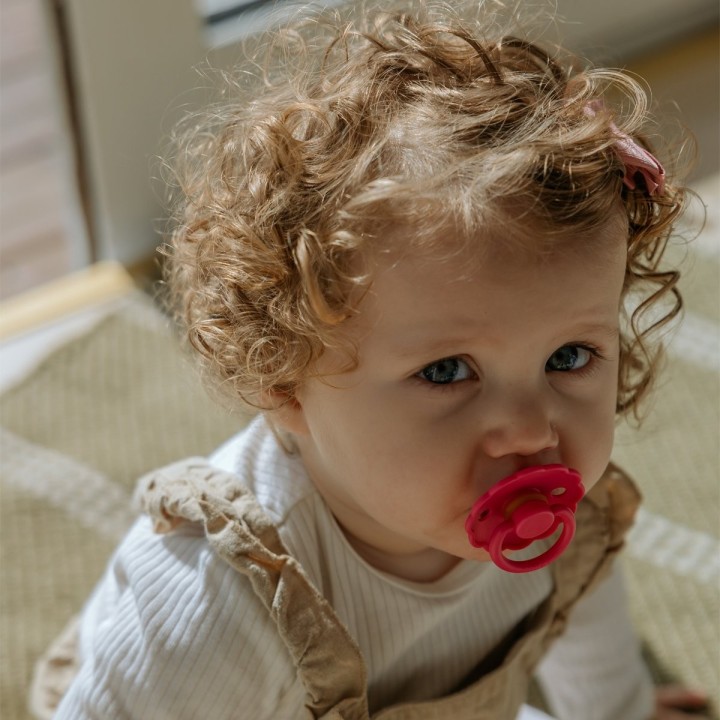 SILICONE PACIFIER BLOCK 2 PACK ROPE/DAISY SUNFLOW./FUCHSIA 6+